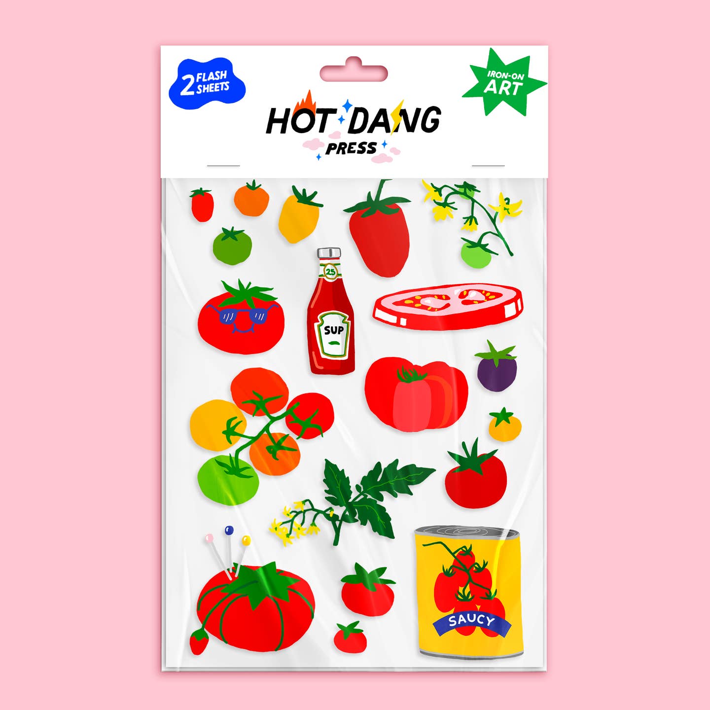 Image of a sheet of iron on transfers with tomatoes, ketchup, can of tomatoes and tomato pin cushion.