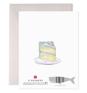 Back of greeting card with white background and image of a piece of birthday cake on a plate. 