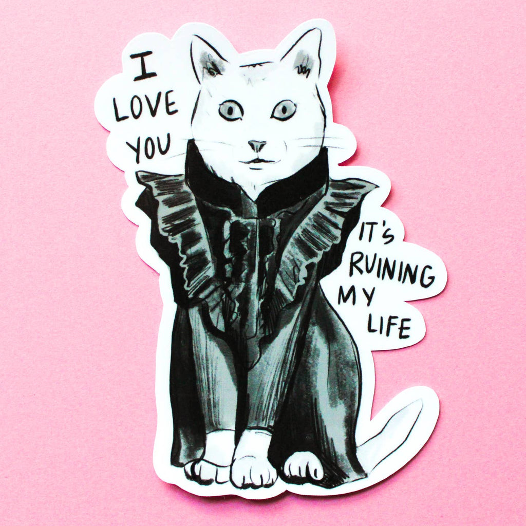 Decorative sticker with image of a white cat wearing a black dress and black text says, "I love you it's ruining my life".