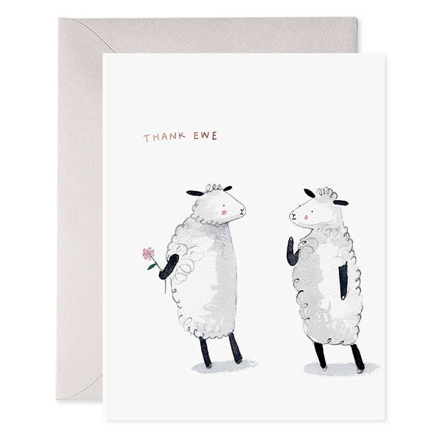 Greeting card with white background with an image of two sheep and one is holding a flower behind thier back. Black text says, "Thank ewe". Grey envelope included.