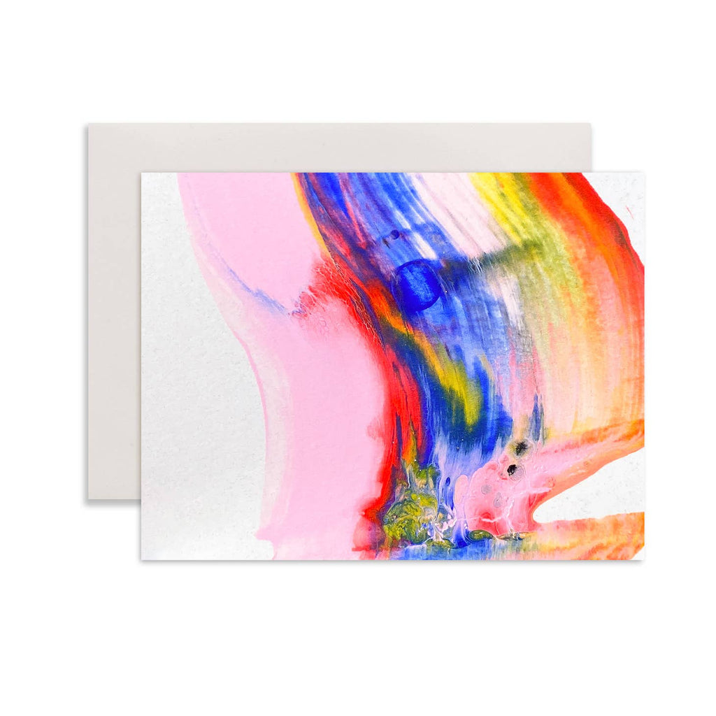 White background with swipes of color in pink, red, blue,  and yellow. White envelopes are included. 