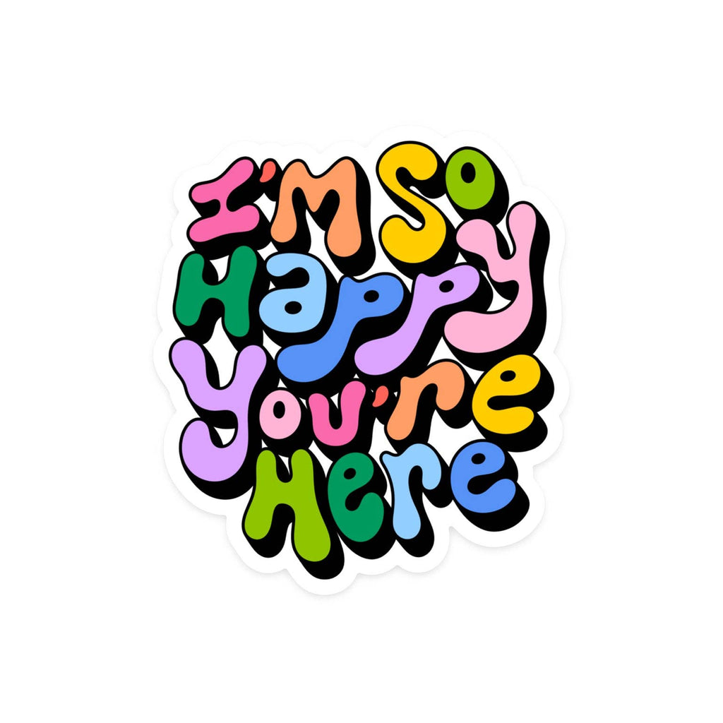 Image of sticker with white background and colorful puffy letters say, "I'm so happy you're here". 
