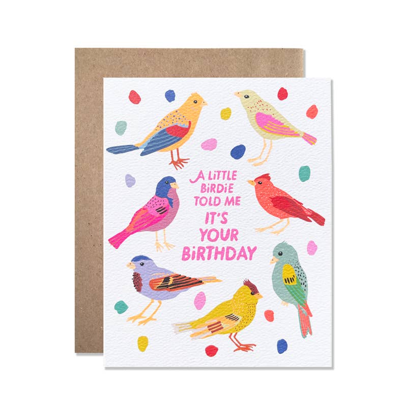 Greeting card with ivory background with images of birdies in yellow, pink, red, aqua, lavender and blue with dots in similar colors. Pink text says, "A little birdie told me it's your birthday". Kraft envelope included.