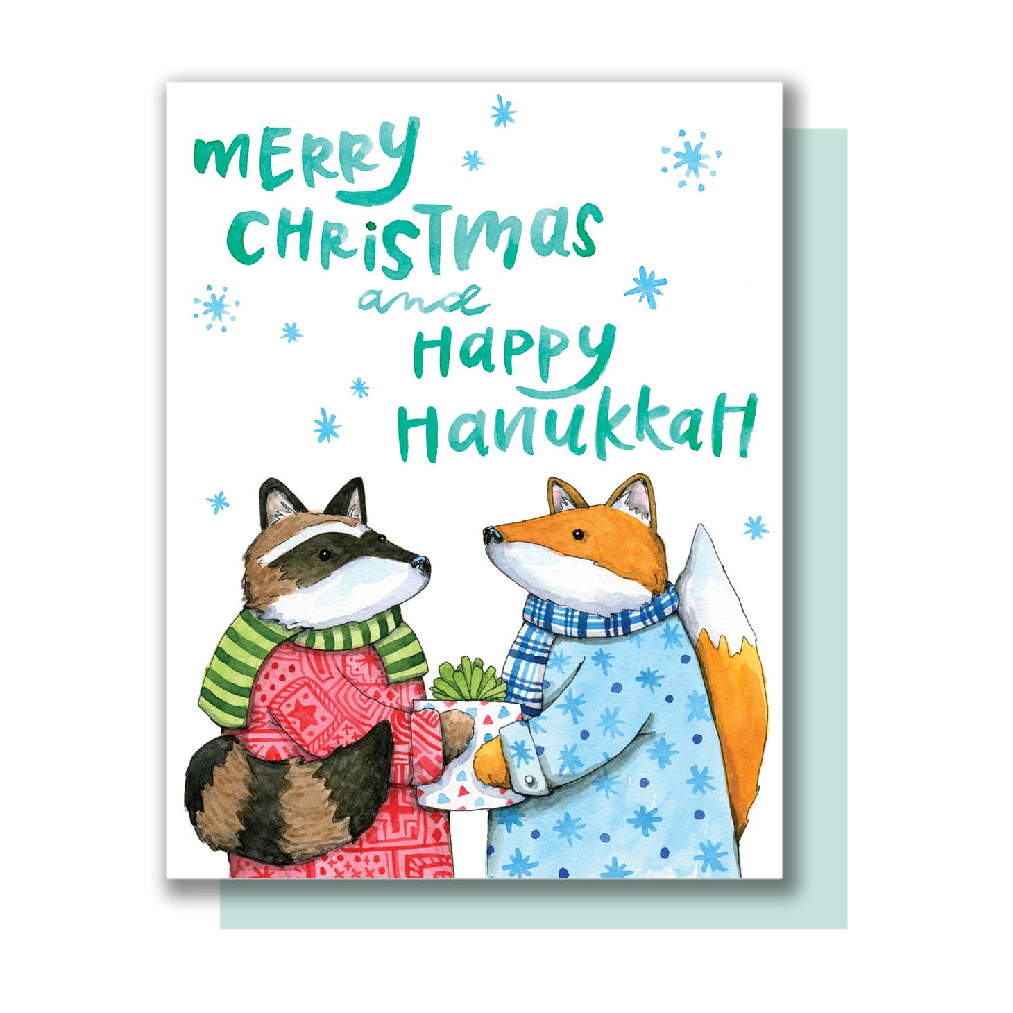 White background with images of raccoon and a fox exchanging presents with aqua text says, "Merry Christmas and Happy Hanukkah".  Aqua envelope included. 