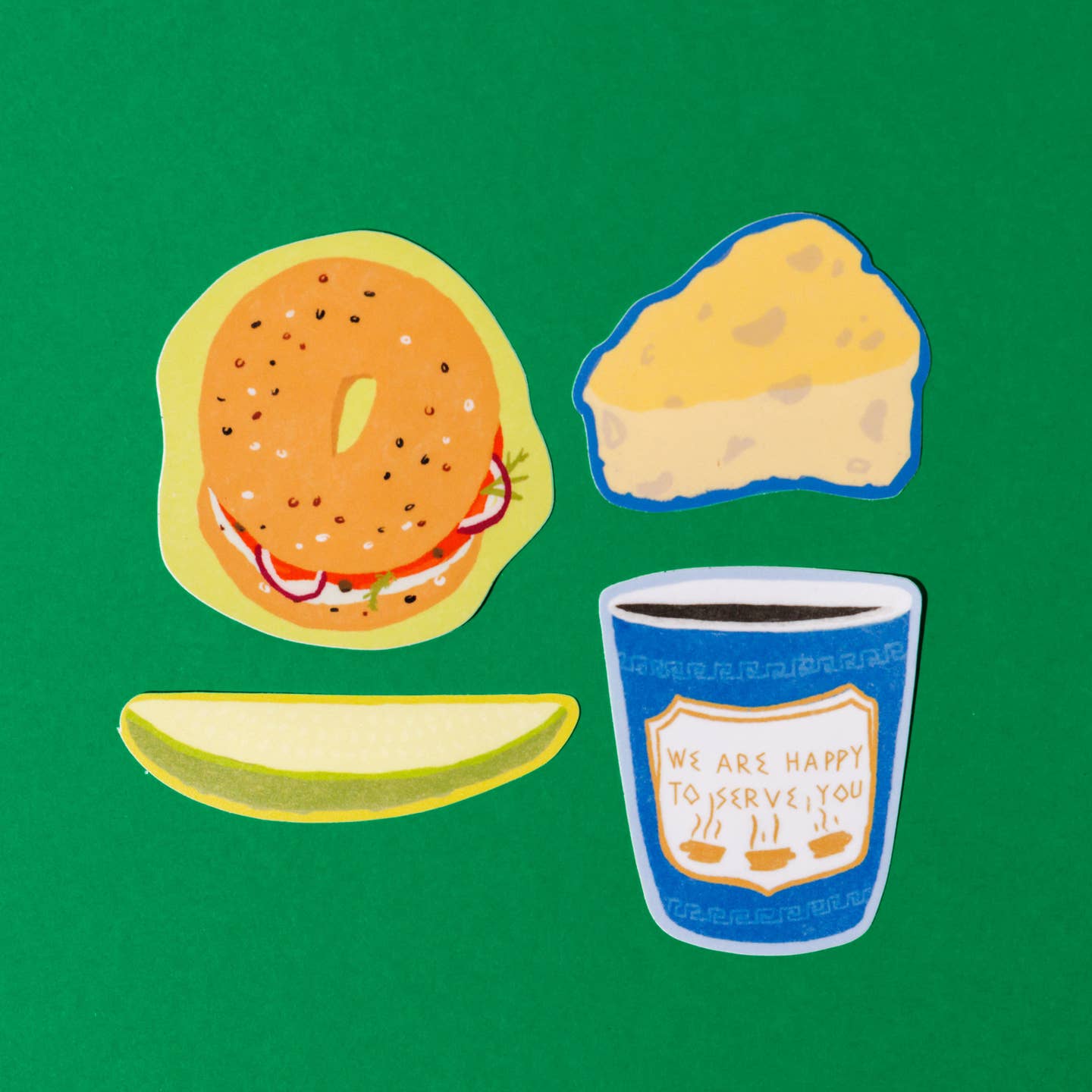 Decorative stickers in the image of a bagel with cream cheese, pickle, wedge of cheese and a cup of take out coffee.