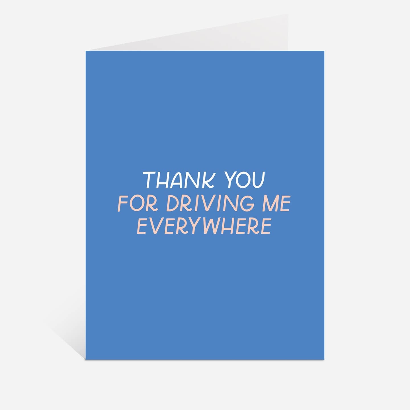 Greeting card with blue background and white and pink text says, "Thank you for driving me everywhere". Envelope included.