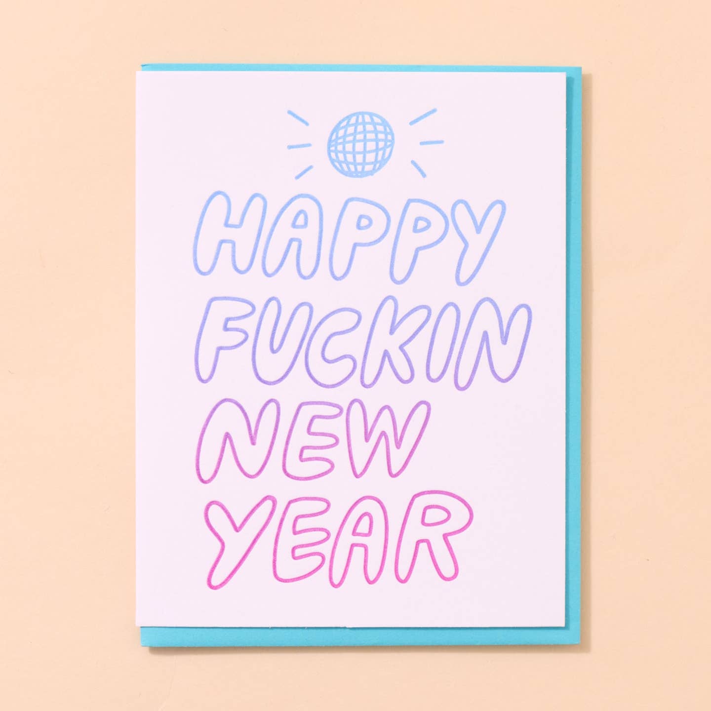 Greeting card with white background and purple and pink outlined text says, "Happy Fuckin New Year" and disco ball above message. Envelope included.