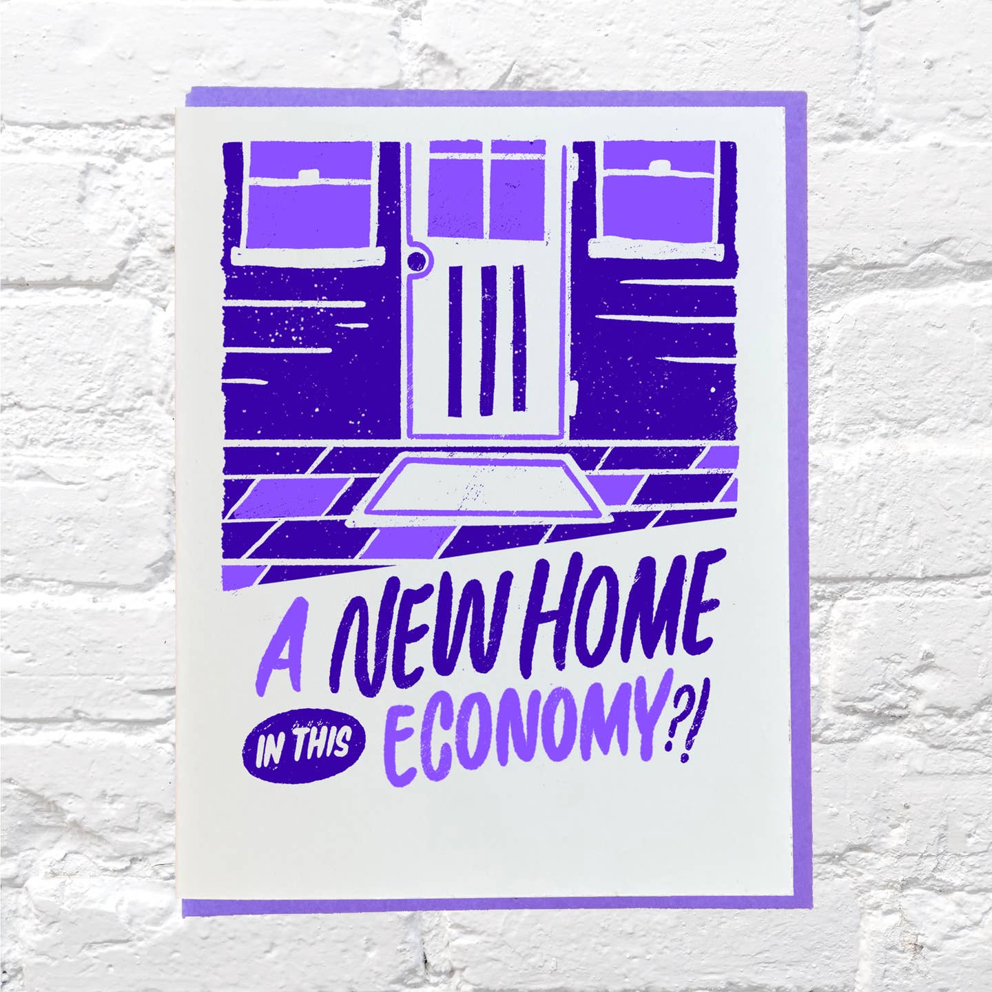 Greeting card with white background and purple image of a front door with purple text says, "A new home in this economy?!". Lavender envelope included. 