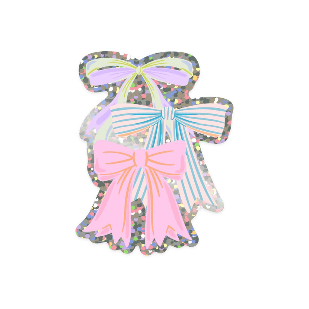 Sticker in the image of three bows in pink, blue and lilac with silver holographic detail. 