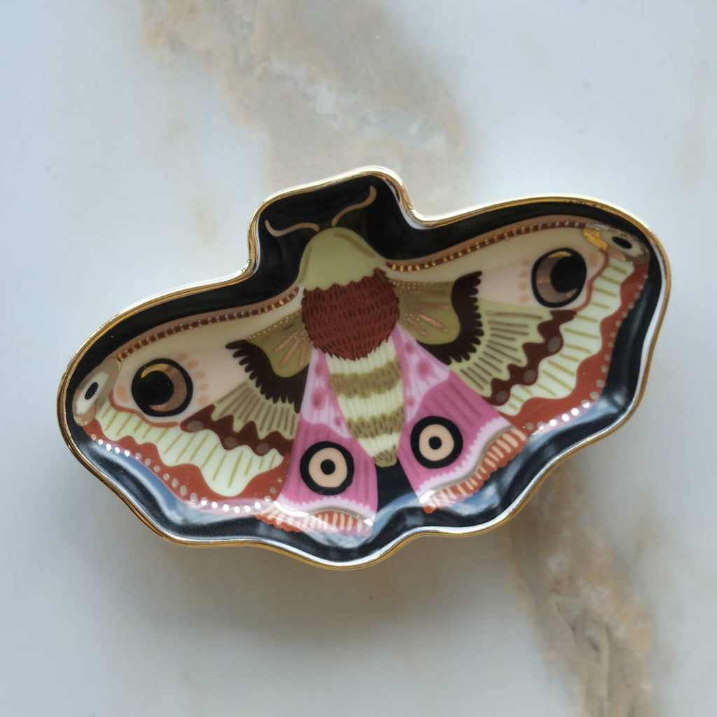 Trinket dish with image of a moon moth painted in bright colors with gold edging.