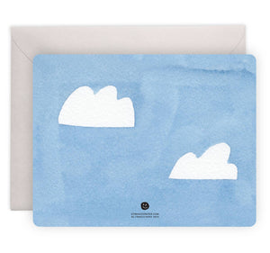 Pale blue background with images of two white clouds and pale grey envelope.  