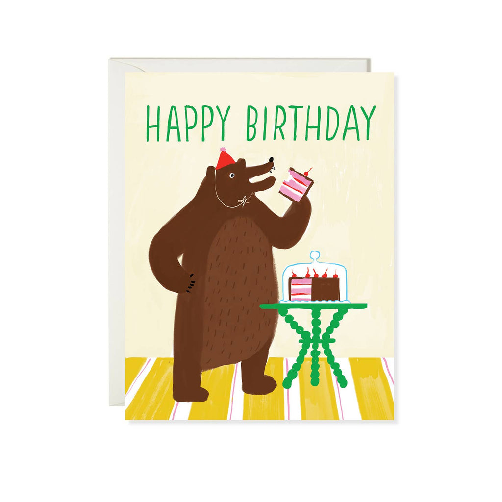 Image of card with white background and image of brown bear wearing a red party hat holding a slice of cake with a table with the cake on it, Green text says, "Happy Birthday". White envelope attached. 