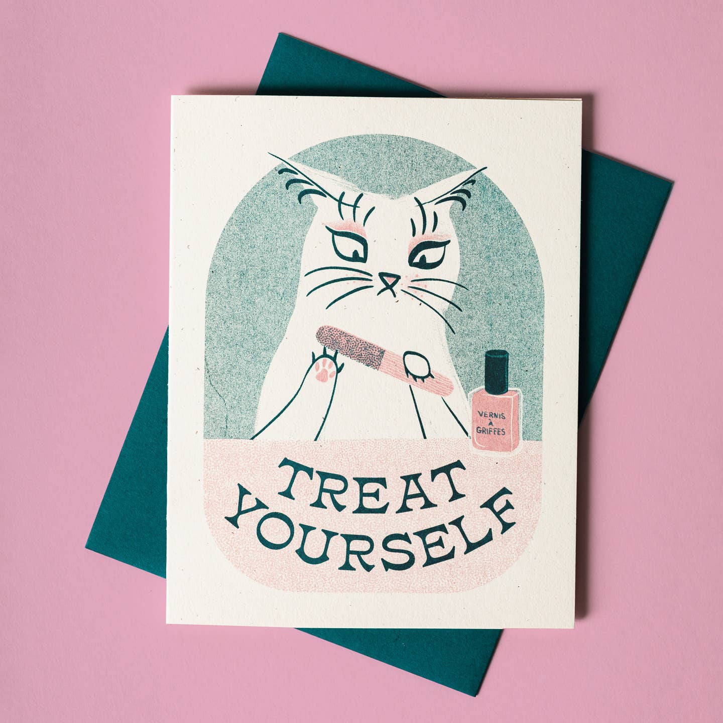 Greeting card with green background and white border with image of a whote can holding a pink nail file and pink bottle of polish with green text says, "Treat yourself". Green envelope included.