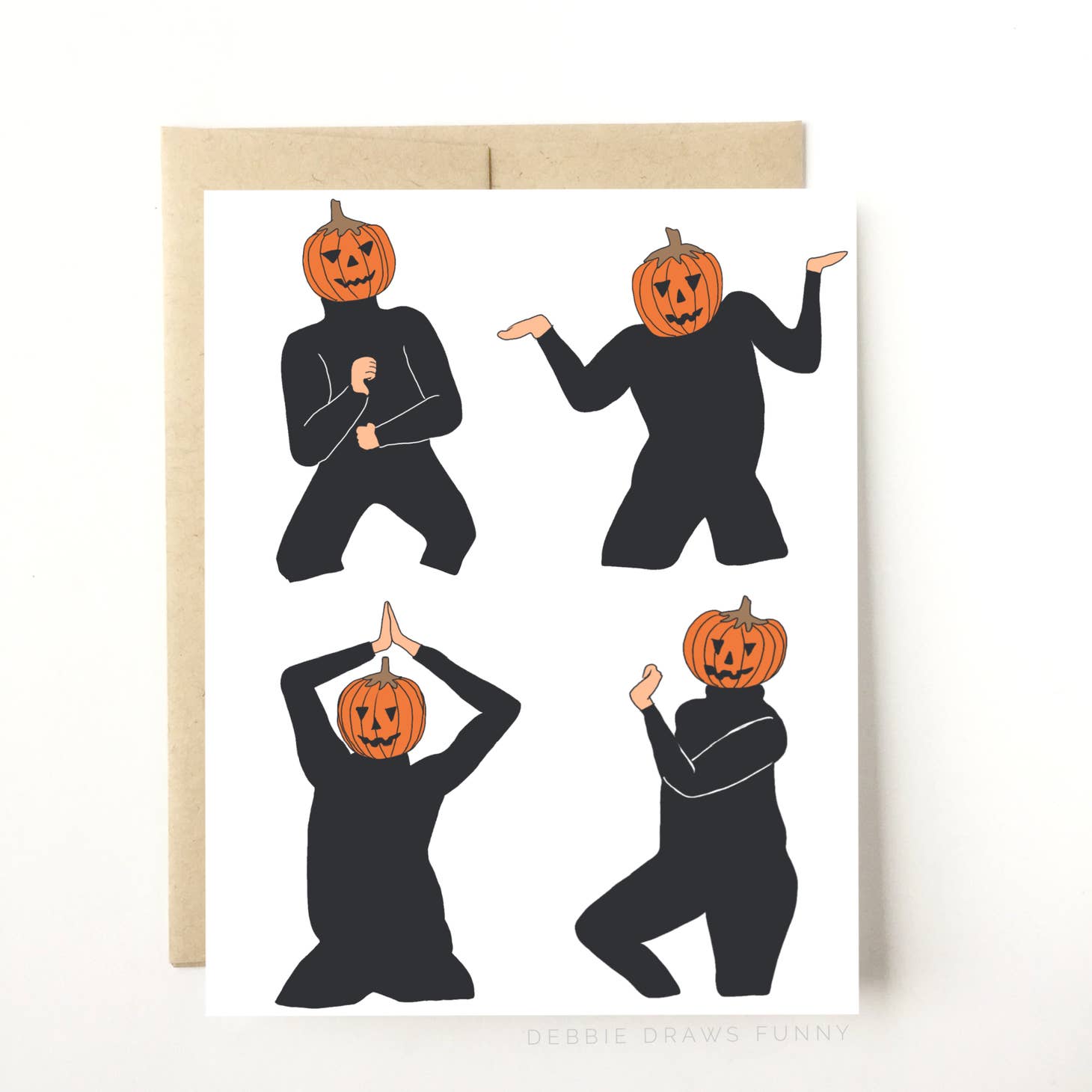 White background with image of pumpkin headed person in black clothing making dance moves. Kraft envelope included. 
