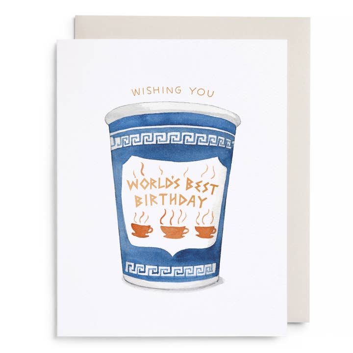 Greeting card with white background and image of blue to go coffee cup with gold text says, "World's best birthday". Grey envelope included.