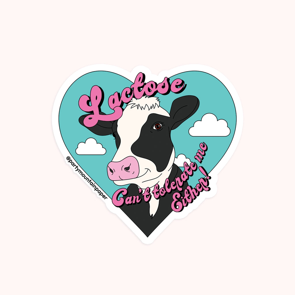 Decorative sticker in heart shape with blue background and image of a black and white cow with pink nose. Pink text says, "Lactose can't tolerate me either!". 