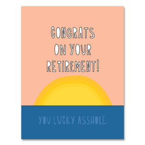 Greeting card with peach, blue and yellow sunset background with white text says, "Congrats on your retirement!". Envelope included. 