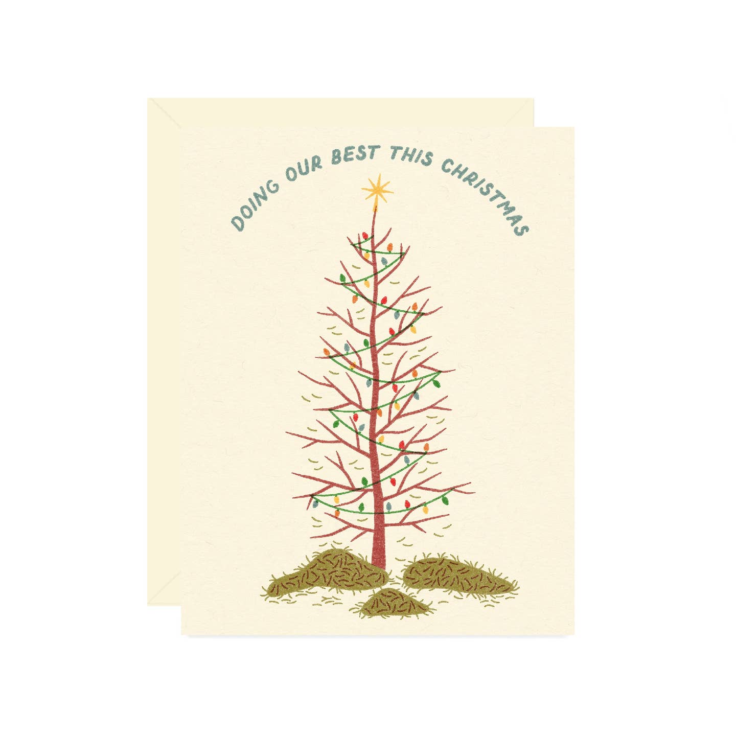 Greeting card with cream background and image of a Christmas tree with light but all the needles fell off and green text says, "Doing our best this Christmas". Envelope included.