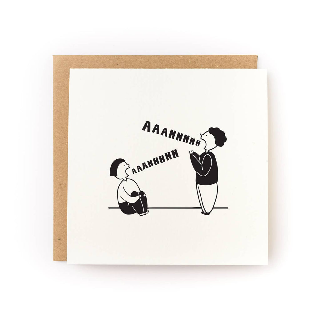 Greeting card with ivory background with black outline drawing of two people yelling and black text says, "AAAHHHHH". Kraft envelope included.