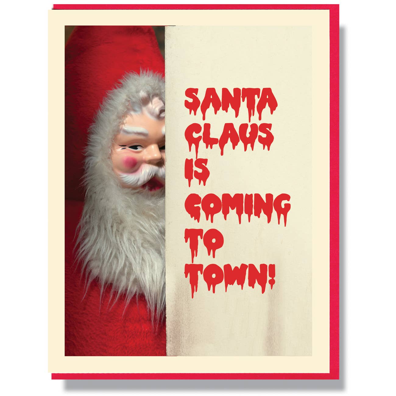 Ivory background with creepy looking Santa is peeking out and red text  that looks like dripping blood says, "Santa Claus is coming to town" . Red envelope included.