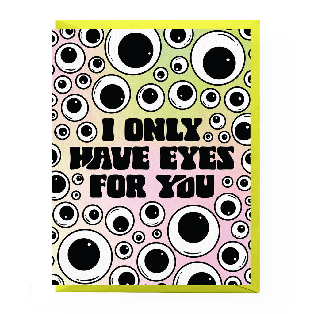 Greeting card with neon green and pink background with black and white googly eyes. Black text says, "I only have eyes for you". Neon green envelope included. 