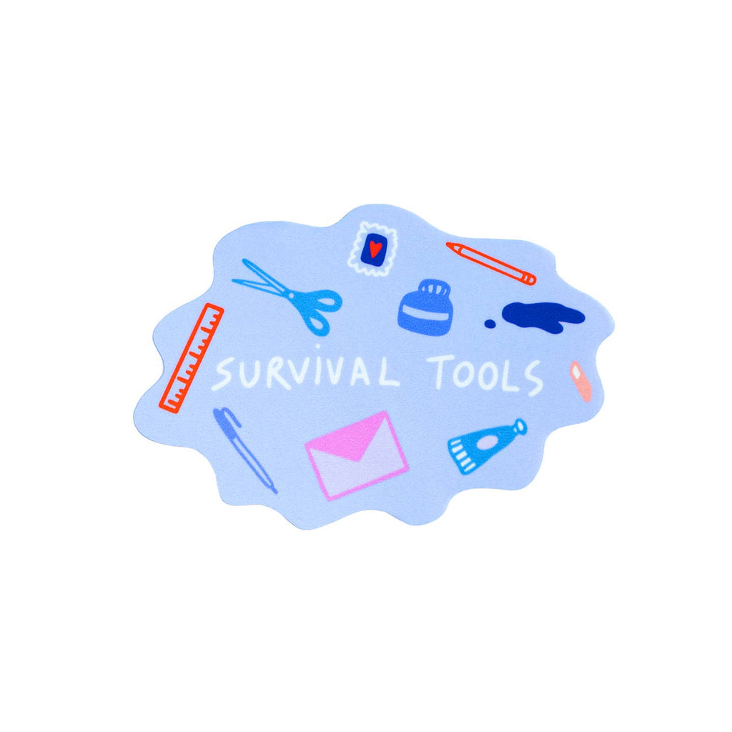 Decorative sticker with lilac background with images of pen, ink, glue, envelope and ruler with white text says, "Survival tools". 