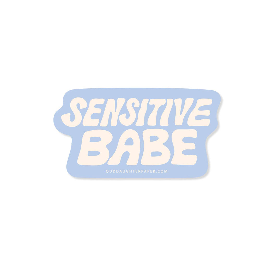 Decorative sticker with blue background and white text says, "Sensitive babe". 