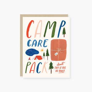 Greeting card with cream background and image of a pink care package and text says, "Camp care pack" , red text says, "Don't eat it all eat it all at once." Kraft envelope is included. 