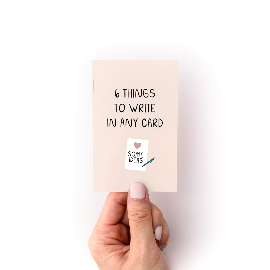 Image of cover of zine with pale pink background and image of card with pen and black text says, "6 things to write in any card".