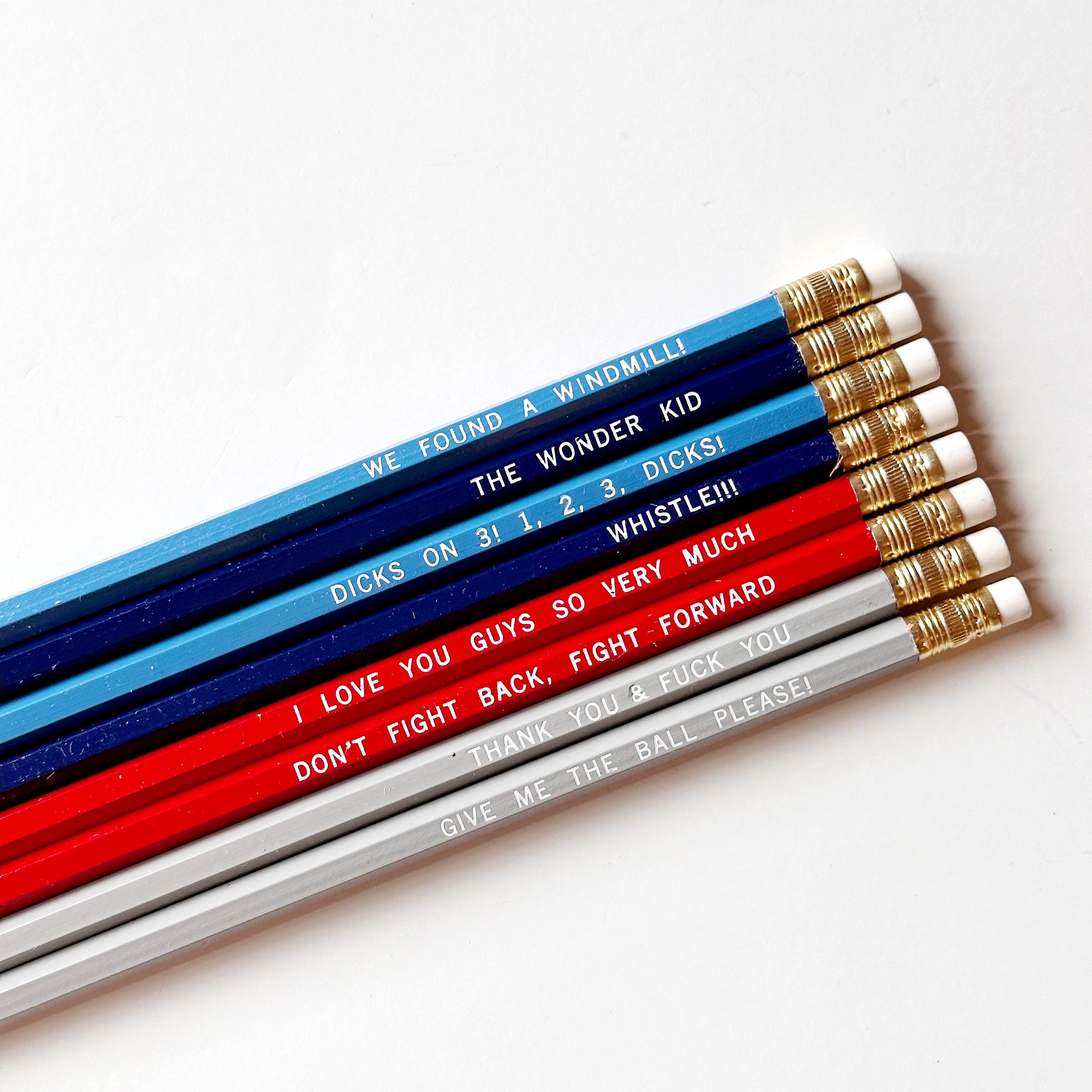 Image of pencil set in blue, red white, white text says, "We Found A Windmill! ","The Wonder Kid ","Dicks on 3! 1, 2, 3, Dicks! ","Whistle!! ","I Love You Guys So Very Much ","Don't Fight Back, Fight Forward ","Thank You & Fuck You","Give Me The Ball Please!".