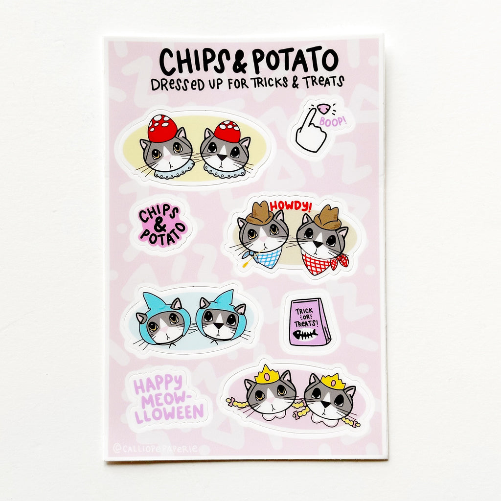 Image of sticker sheet with pink background with images of Chips and Potato cats wearing costumes. 