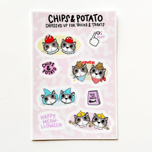 Image of sticker sheet with pink background with images of Chips and Potato cats wearing costumes. 