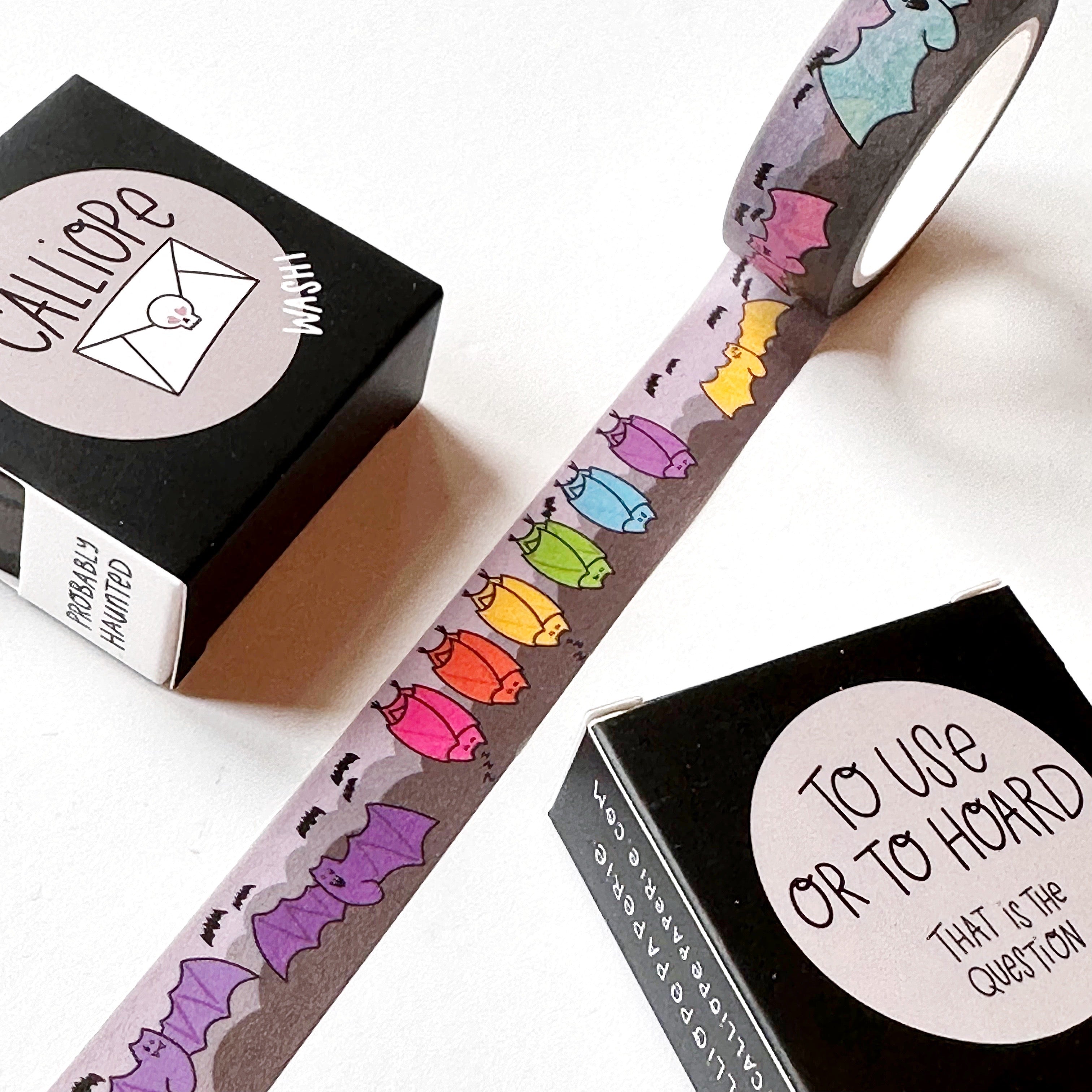 Image of Washi tape with images of bats in rainbow colors .