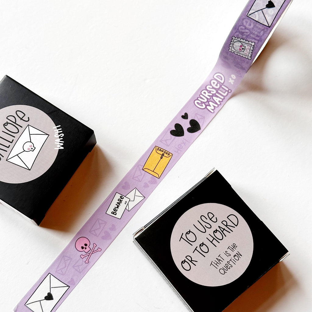 Washi tape with lilac background with place and white images of letters, cursed mail and black hearts. 