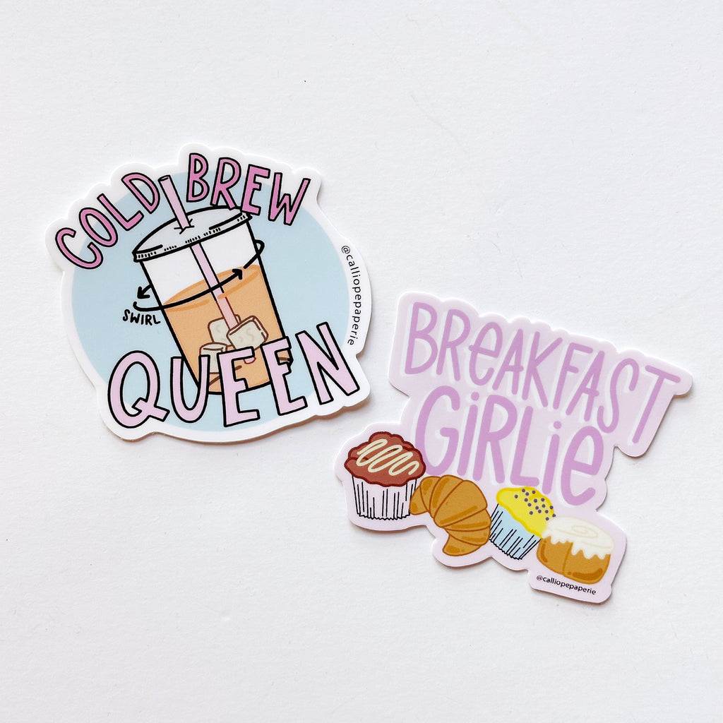 Images of two stickers. One is image of iced coffee with pink text says, "Cold brew queen".  Pink background with images of breakfast goodies and pink text says, "Breakfast girlie". 