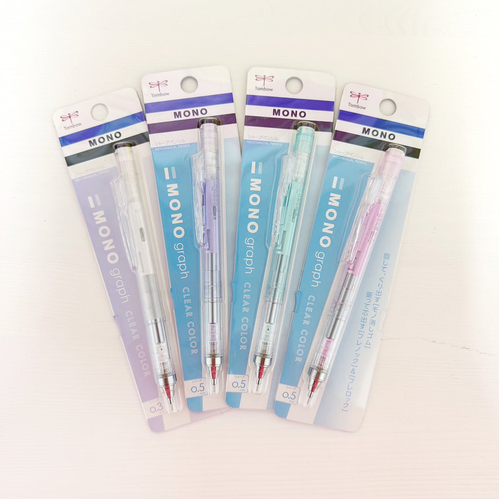 Mechanical pencils in clear, lilac, mint green and pink barrels.