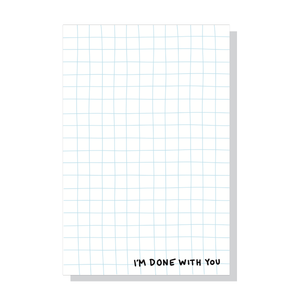 Notepad with blue grid on white background with black text in bottom right corner says, "I'm done with you". 