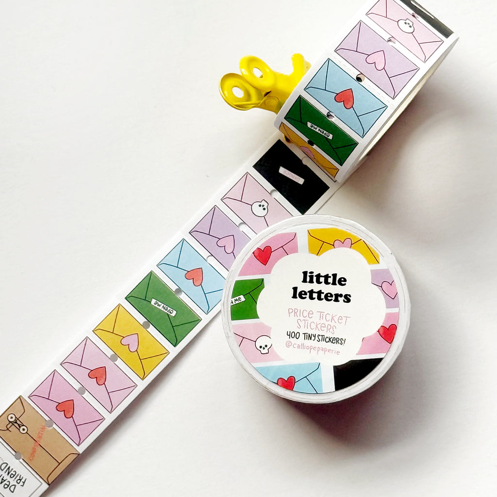 Image of tiny decorative stickers with images of envelopes in bright and pastel colors.