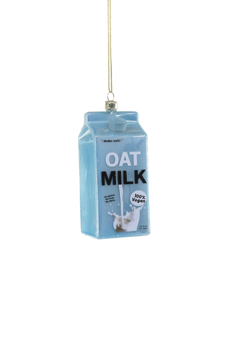 Image of a carton of oat milk in blue with white and black text says, "Oat milk". 