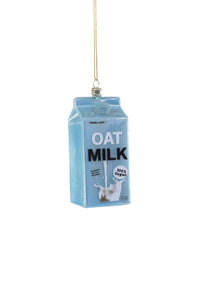 Image of a carton of oat milk in blue with white and black text says, "Oat milk". 