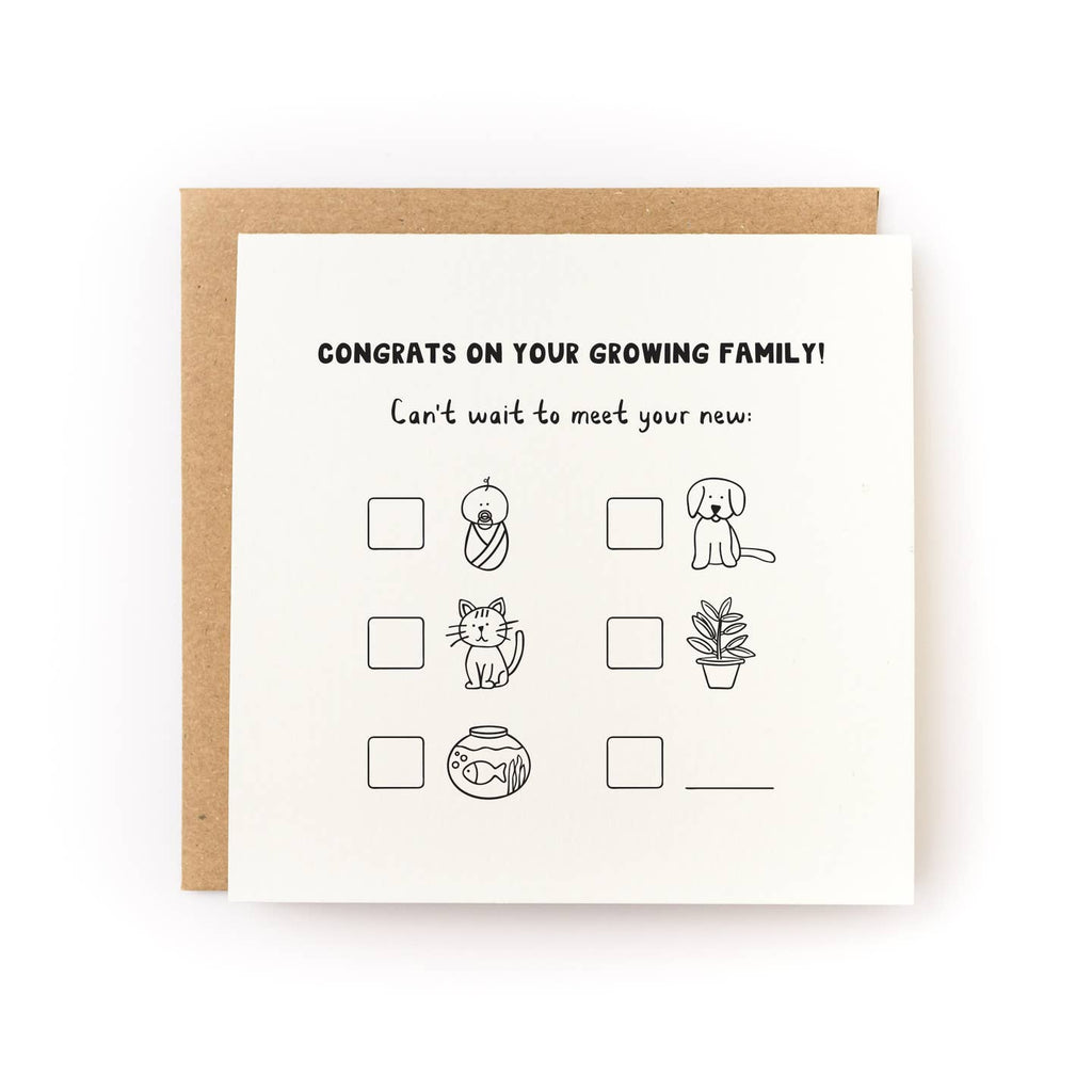 Greeting card with ivory background and black outline drawings of a baby, a puppy, a kitty, a fish, a plant and a space to add your own thing. Black text says, "Congrats on your growing family! Can't wait to meet your new:". Kraft envelope included. 