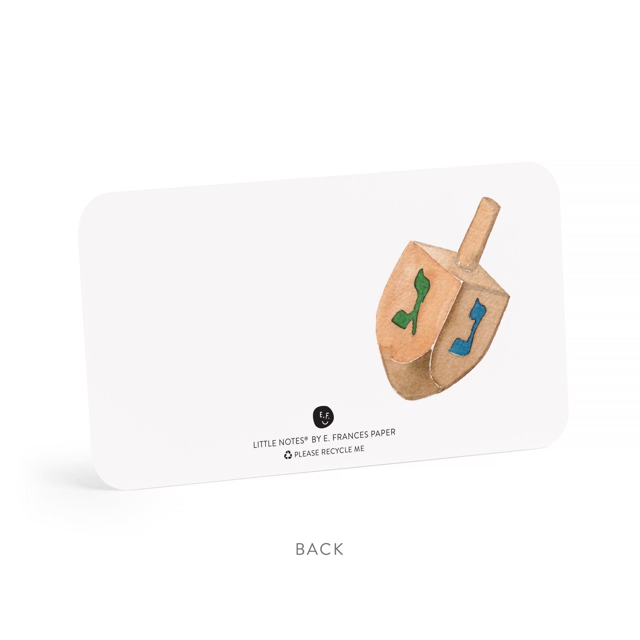 Mini note card with white background and image of a dreidel on right side of card.  