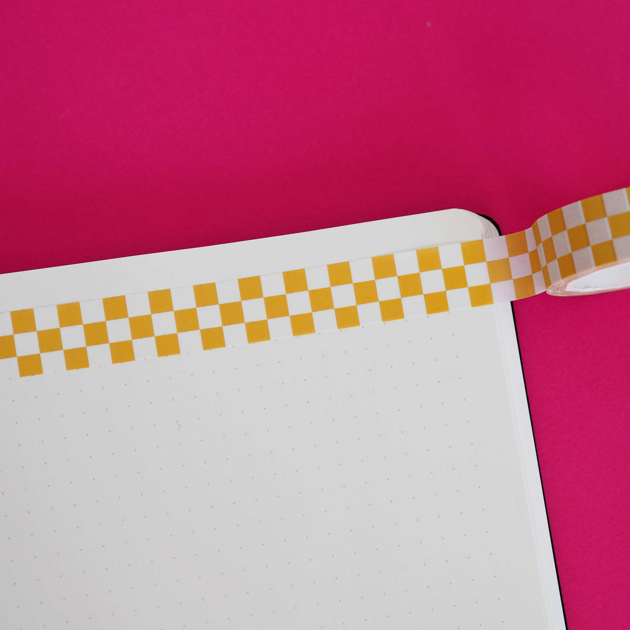 Washi tape in mustard and white checkerboard pattern.