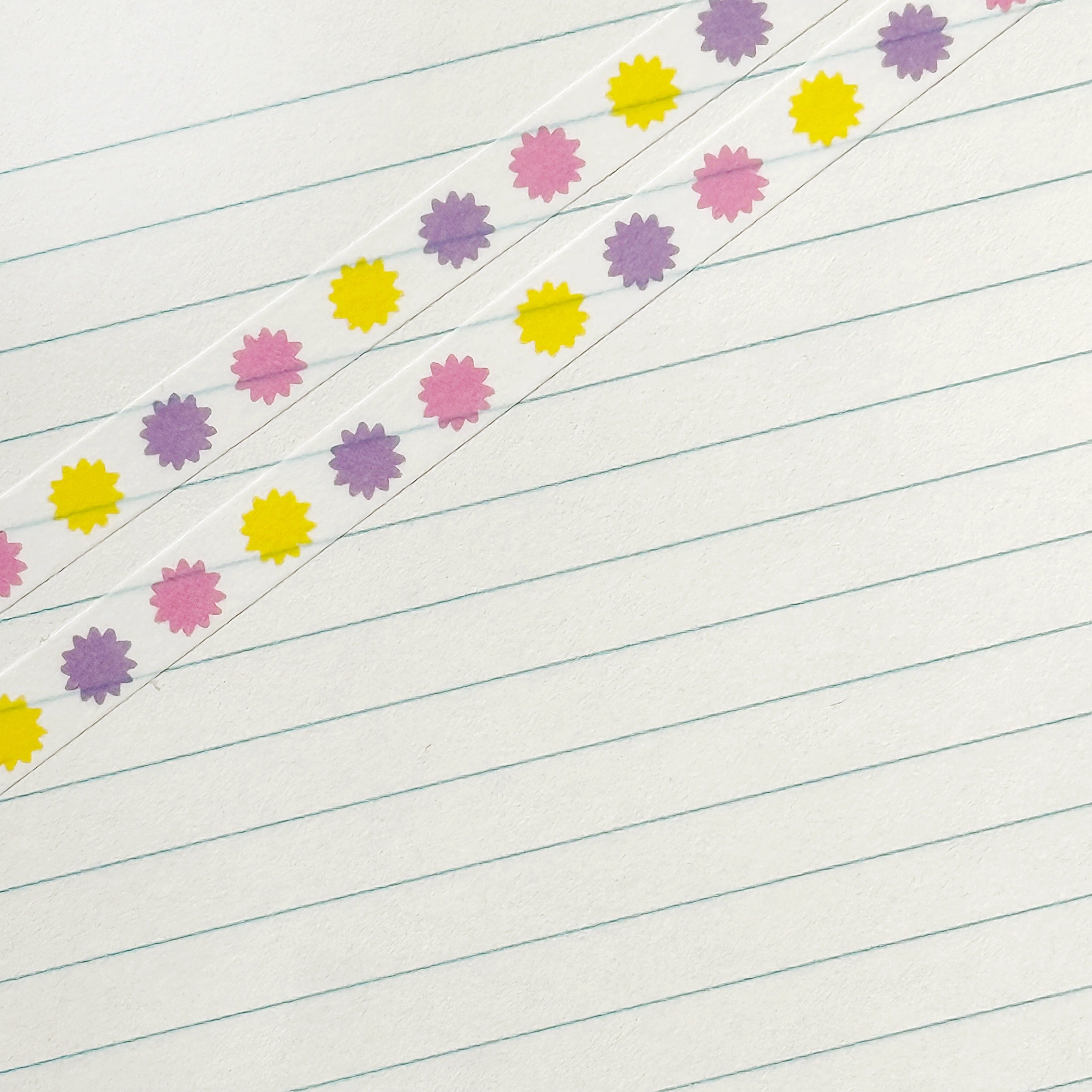 Decorative tape with micro starbursts in pink, yellow and lilac.