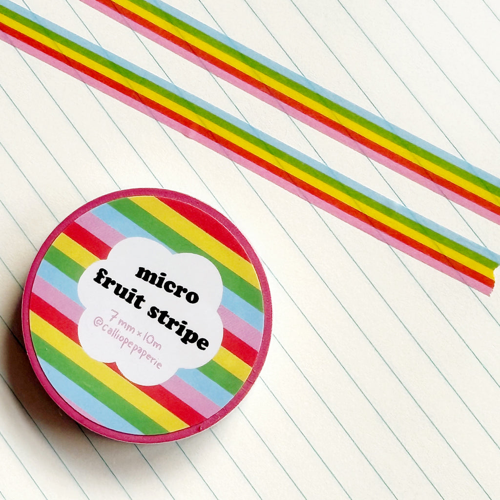 Decorative tape with rainbow stripe of red, yellow, green, blue and lilac.