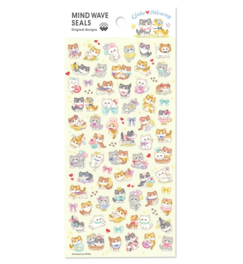 Sticker sheet with yellow background and images of kitties playing.
