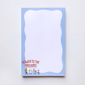 Notepad with white background with blue border and image of paper street team, including pencil, sheet of paper, notepad and tape with red text says, "Power to the paper people". 