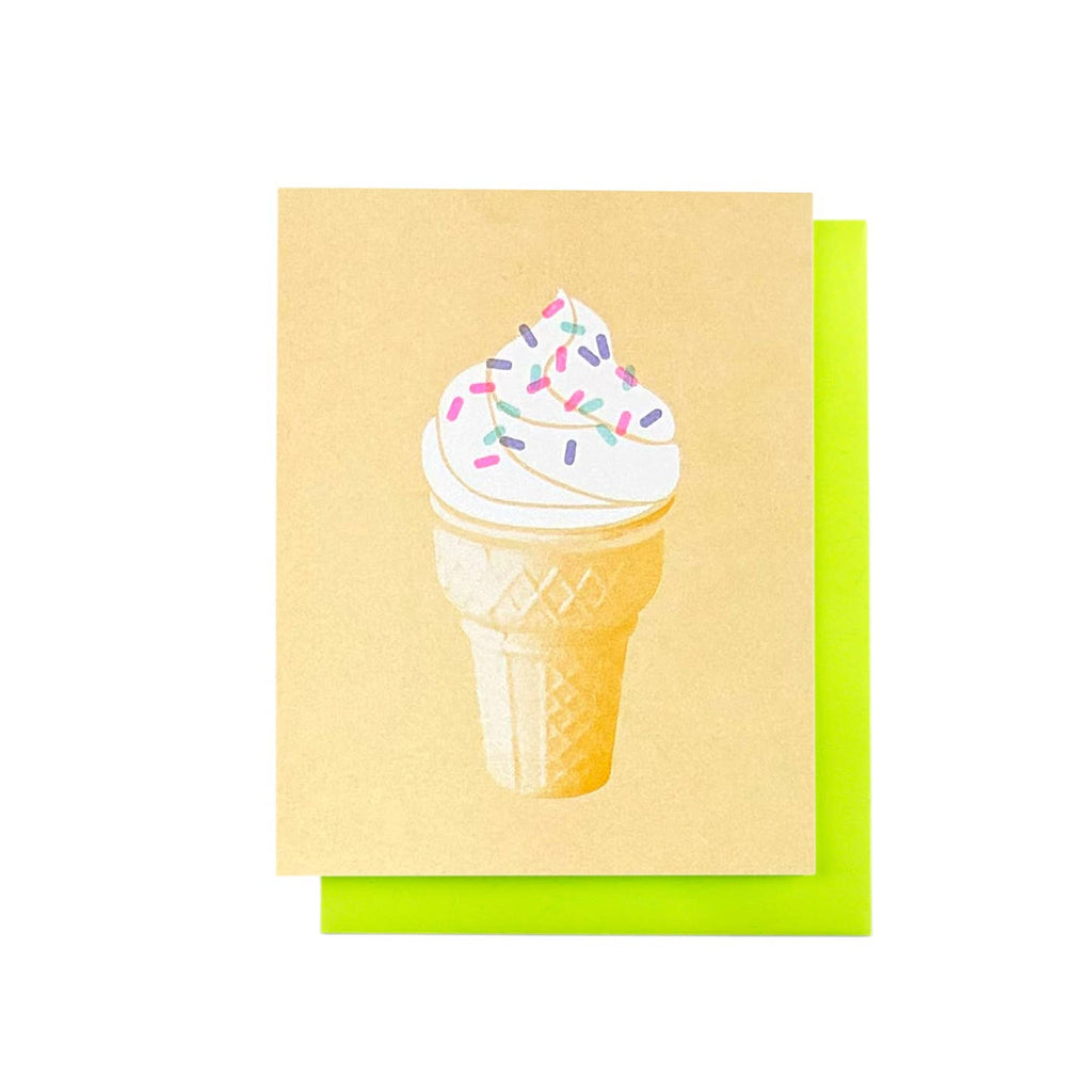 Greeting card with tan background and image of a vanilla soft serve ice cream cone with sprinkles. Neon green envelope included.