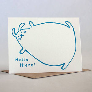 White background with image of blue bunny and blue text says,”Hello there!”. Kraft envelopes are included.  