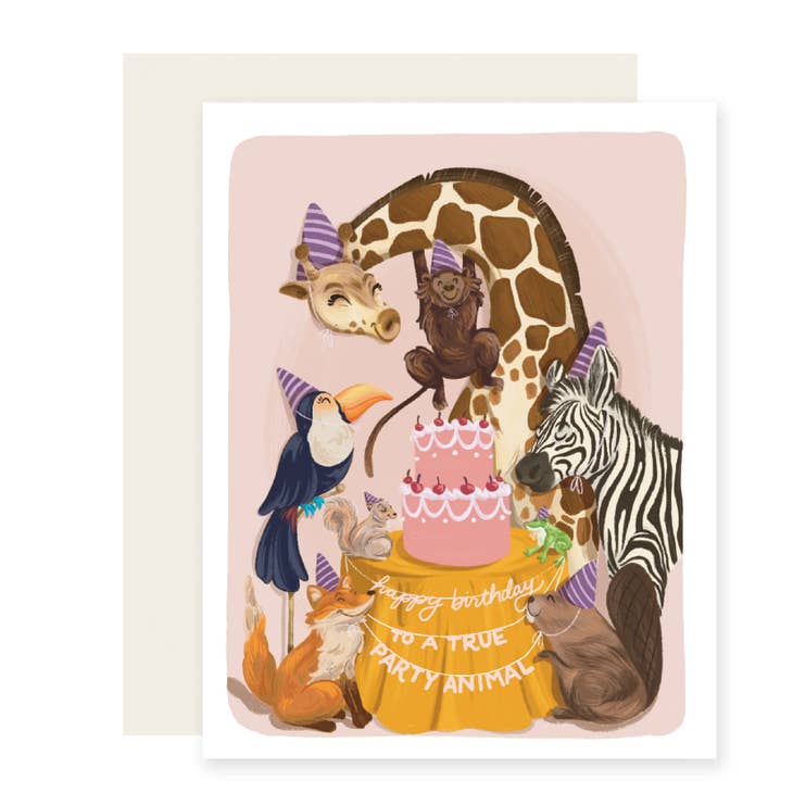 Pink background with white frame and images of giraffe, zebra, monkey, beaver, fox and macaw wearing party hats surrounding a birthday cake. White text says, "Happy birthday, to a true party animal. Cream envelope included. 